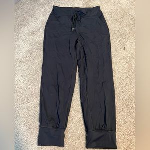 Black, cropped jogger style leggings, mid calf length; size small